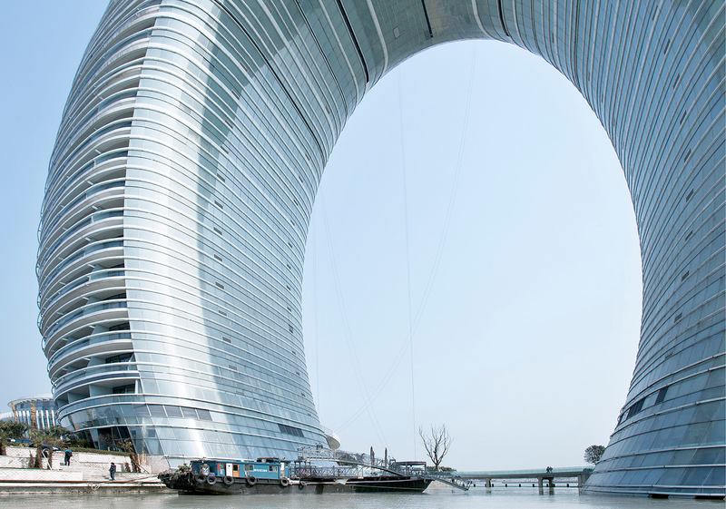 Illustration for article titled These Fantastic Buildings Are Like Wedding Rings For Giants